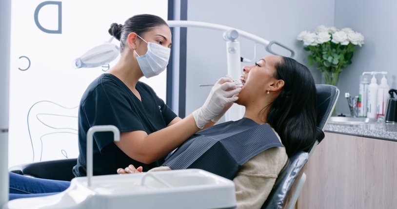 Dental exam showing stress-related oral health issues during a routine checkup in St. Louis, MO.